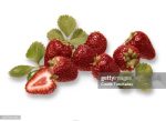 strawberries with leaves on white background
